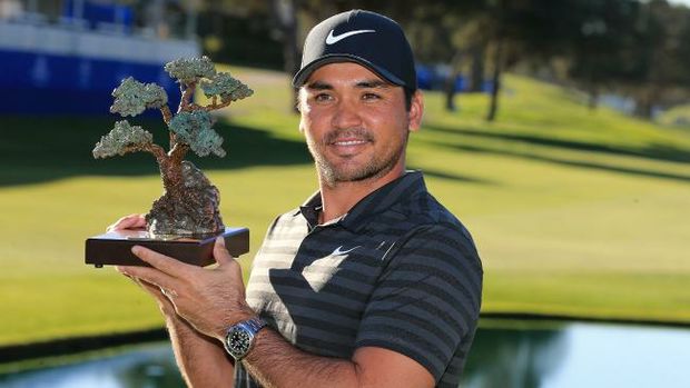 Jason Day with the Farmers Insurance Open trophy