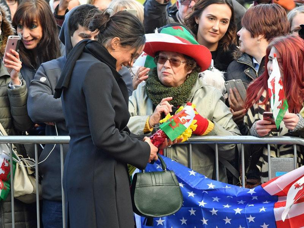 Meghan Markle meets the crowds during a visit to Cardiff Castle