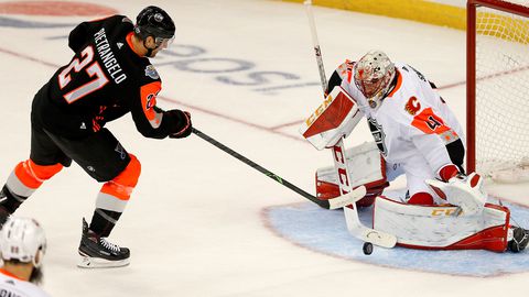 Pacific goalie Mike Smith of the Calgary Flames blocks a shot by Central defenseman Alex Pietrangelo of the Blues.	 Reinhold Matay-USA TODAY Sports