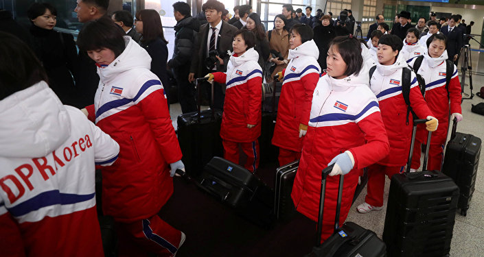 North Korea's women ice hockey athletes arrive at the South's CIQ, just south of the demilitarized zone separating the two Koreas in Paju