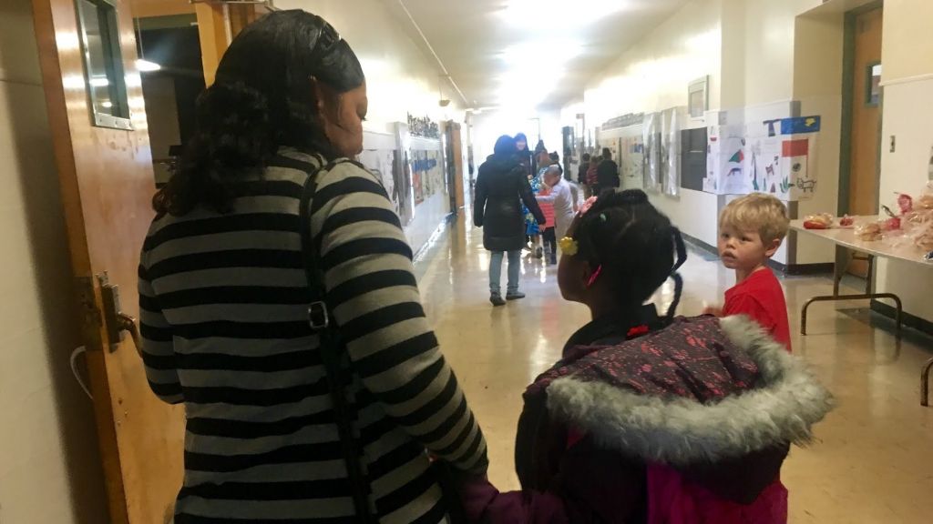 Ronda Chiles left and her granddaughter right stand in the halls of Martin Luther King Jr. School in Portland Oregon