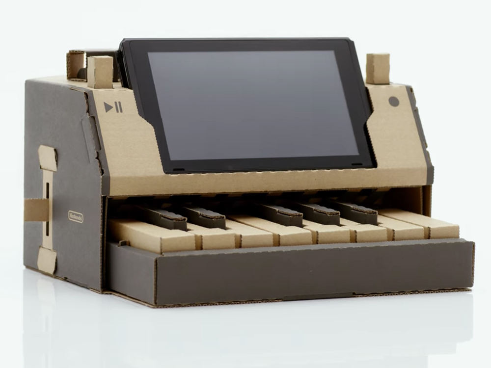 The Nintendo Labo Variety Kit for Nintendo Switch includes a cardboard punchout model of a working