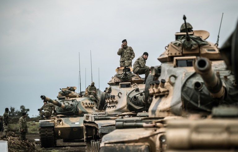 Turkish army tanks near the Syrian border on Sunday