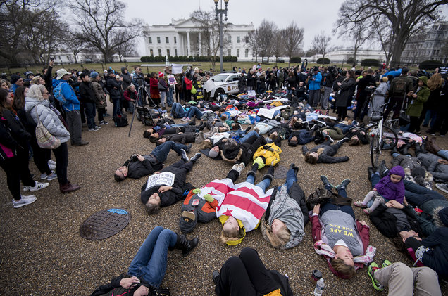 Bill Clark  CQ Roll Call
Students and supporters protest against gun violence with a lie-in outside of the White House on Feb. 19 2018