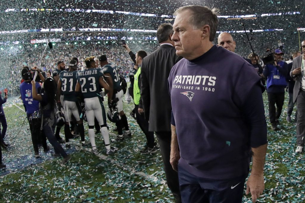 New England Patriots head coach Bill Belichick walks off the field after losing Super Bowl LII to the Philadelphia Eagles on Sunday in Minneapolis