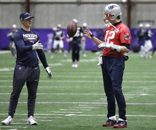 New England Patriots quarterback Tom Brady is favored to win Super Bowl LIII after losing tot he Philadelphia Eagles 41-33 in Super Bowl LII on Sunday.
Here Brady catches a ball as he warms up during a practice Thursday Feb. 1 2018 in Minneapolis. (A