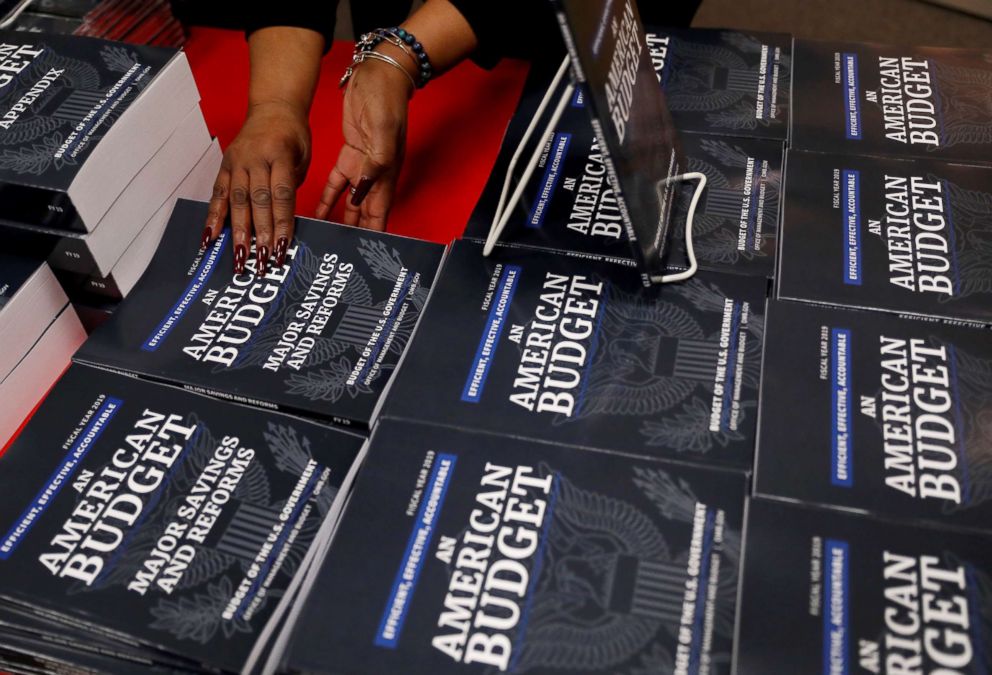 Office employee Darlene Matthews arranges new copies of President Donald Trumps Budget for the U.S. Government for the Fiscal Year 2019 at the U.S. Government Publishing Office in Washington D.C. Feb. 12 2018