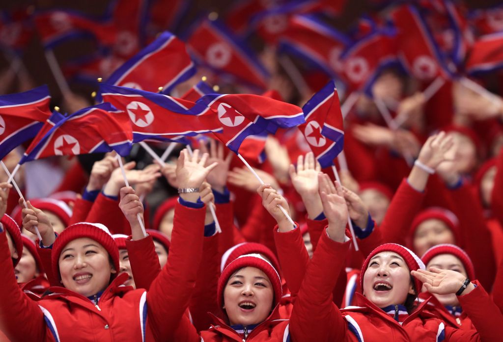 South Korean protesters burn flags and photos of Kim Jong-un