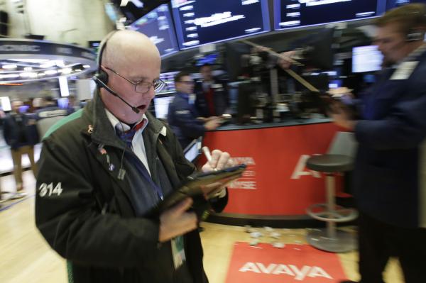 The Dow lost more than 300 points Monday continuing a slide that began with a 666-point drop on Friday. File