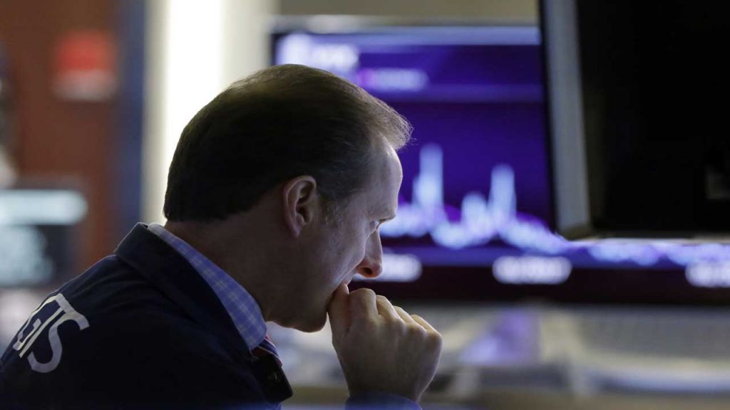 Specialist Glenn Carell works on the floor of the New York Stock Exchange Friday Feb. 2 2018. The stock market closed sharply lower extending a weeklong slide as the Dow Jones industrial average plunged more than 600 points