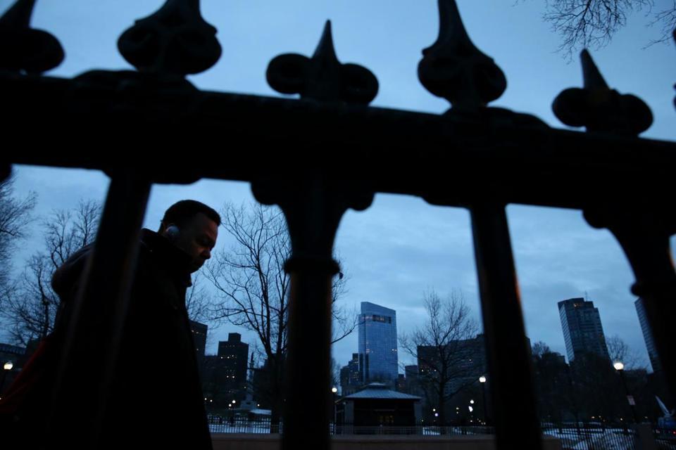 A pedestrian walked down Charles Street in Boston on Wednesday as the city prepared for its fourth storm this month