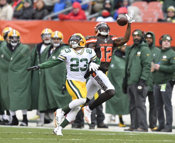 Cleveland Browns wide receiver Josh Gordon reaches for a pass against Green Bay Packers cornerback Damarious Randall during an NFL football game against the Cleveland Browns Sunday Dec. 10 2017 in Cleveland. The Packers won 27-21 in overtime