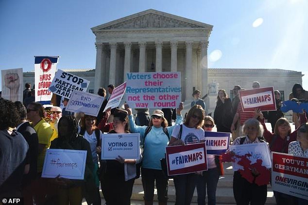 Demonstrators gather outside The United States Supreme Court