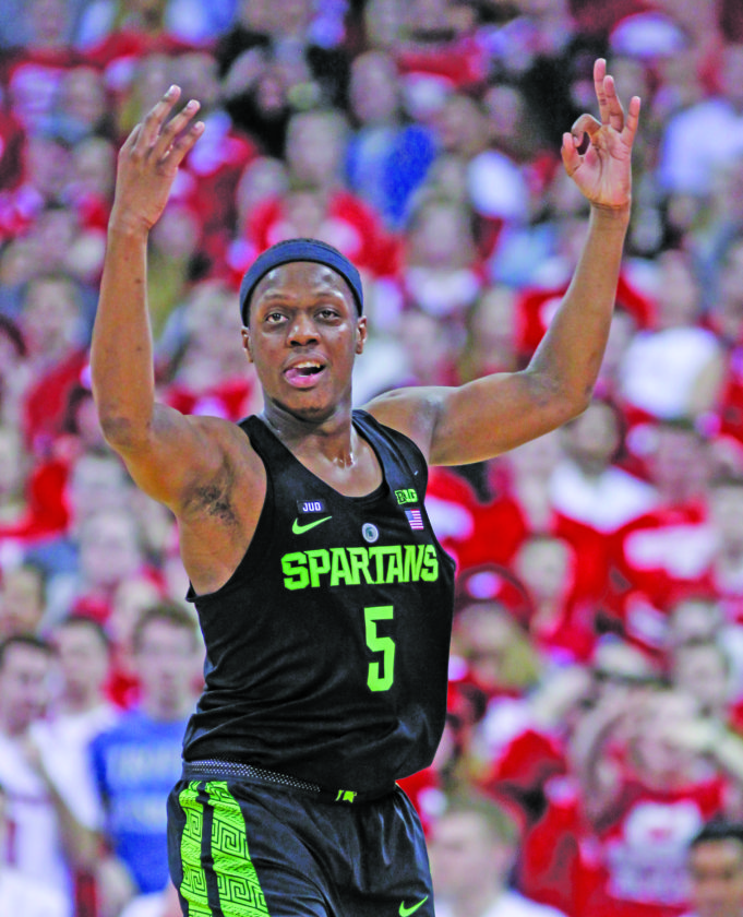 Winston celebrates after making a 3-point basket against against Wisconsin during the second half Sunday in Madison