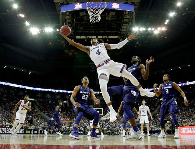 Kansas Devonte Graham puts up a shot during the second half of an NCAA college basketball game against Kansas State in the semifinals of the Big 12 conference tournament in Kansas City Mo. Friday