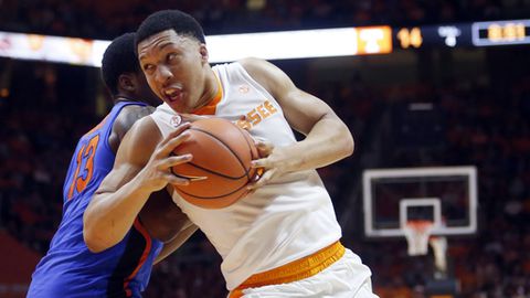 Tennessee forward Grant Williams drives the ball around Florida forward Kevarrius Hayes during the first half of an NCAA college basketball game in Knoxville Tenn. Williams was selected to the AP All-SEC