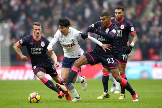 Son Heung Min battles for the ball