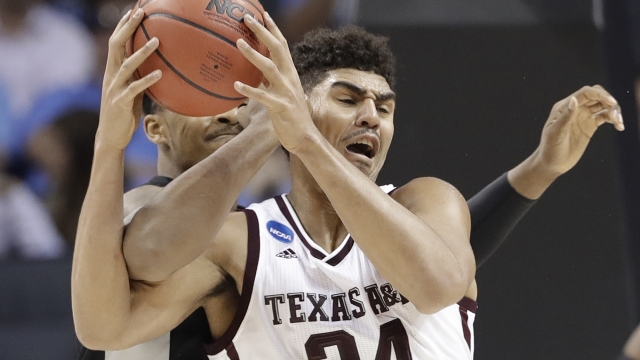 The Latest A&M-Providence start NCAA Day 2 with ugly half