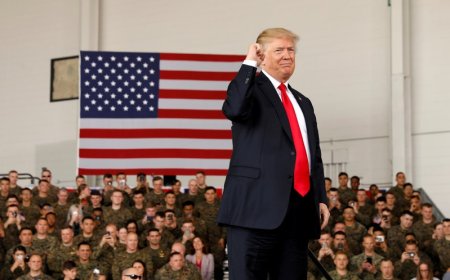 U.S. President Donald Trump pumps his fist after speaking at Marine Corps Air Station Miramar in San Diego California