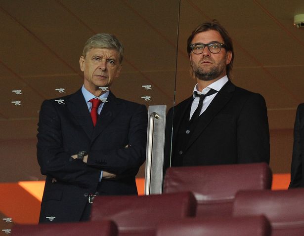 Arsenal manager Arsene Wenger with Dortmund Head Coach Jurgen Klopp in the Directors box ahead of the UEFA Champions League Group F match between Arsenal and Borussia Dortmund at Emirates Stadium