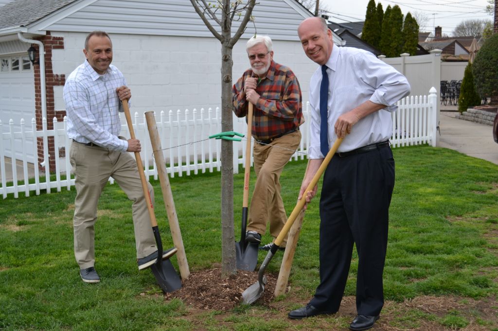 Kindergarteners plant trees for Arbor Day in Myrick Park