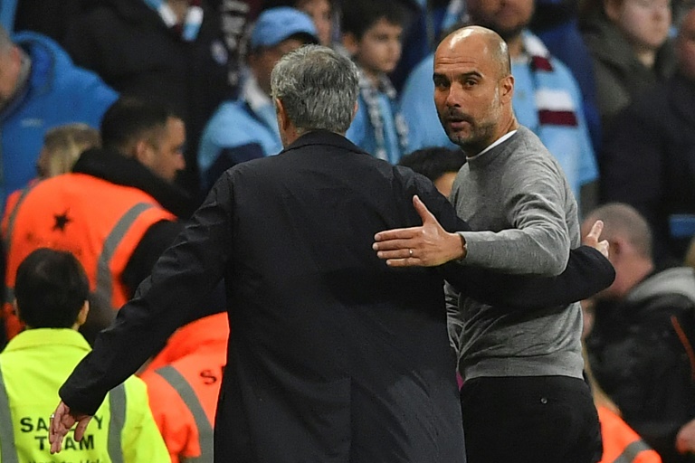 Don’t look back Pep Guardiola leaves the pitch with Jose Mourinho after his team’s 3-2 defeat on Saturday