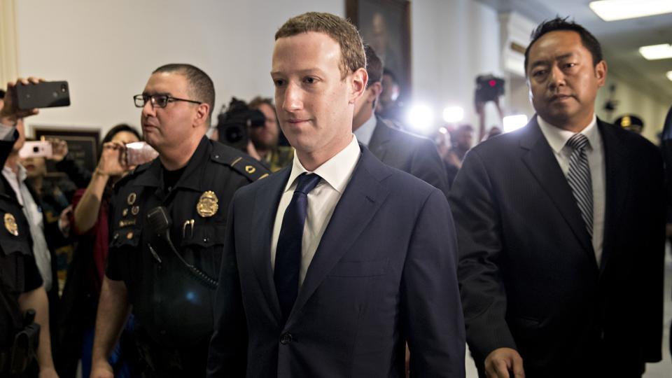 Mark Zuckerberg chief executive officer and founder of Facebook Inc. walks through the Rayburn House Office building before a House Energy and Commerce Committee hearing in Washington D.C. on Wednesday