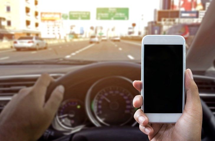 Georgia lawmakers look to ban handheld devices while driving