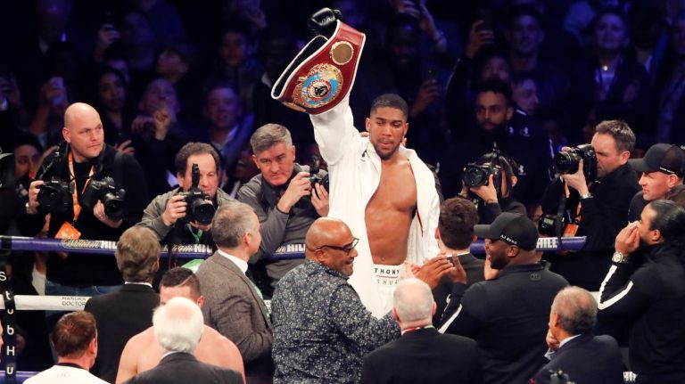 Britain's Anthony Joshua celebrates his victory over New