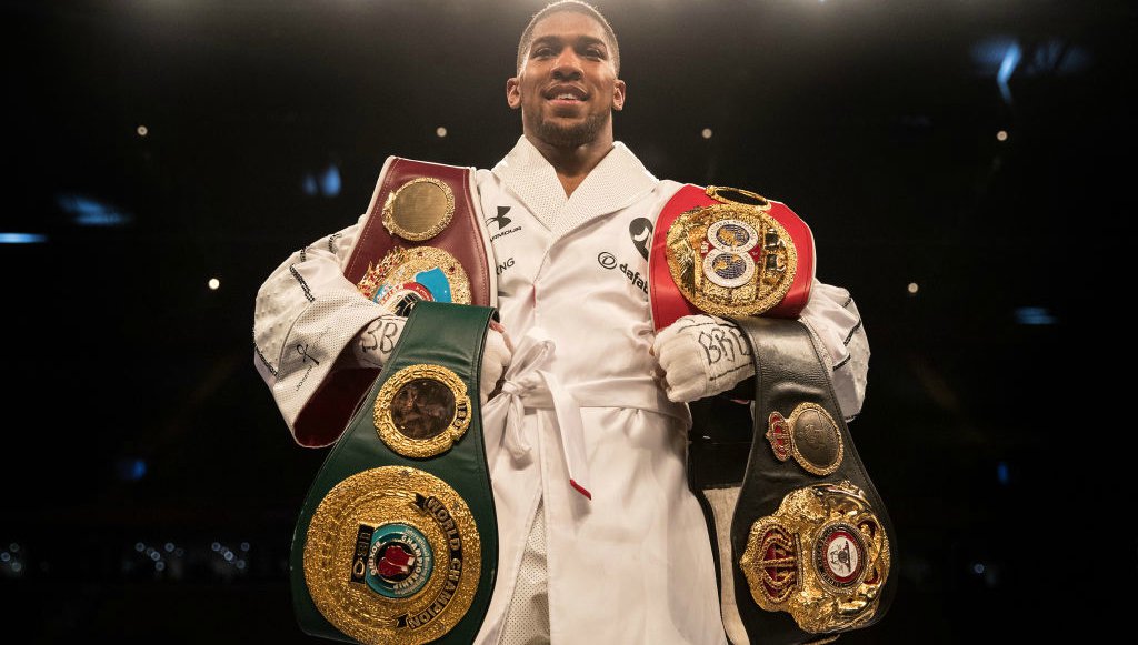 Anthony Joshua unifies 3 heavyweight belts with first decision win