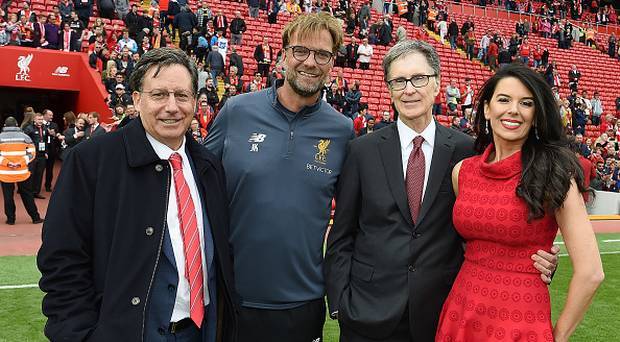 Liverpool Chairman Tom Werner poses with manager Jurgen Klopp and principle owner John W Henry and his wife Linda