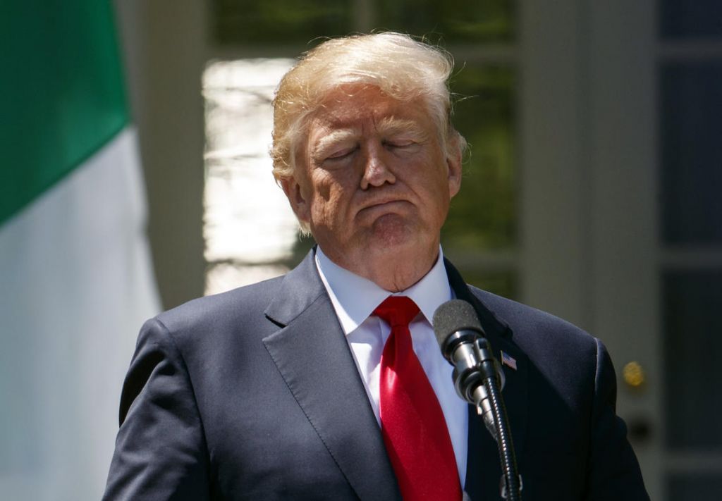 President Donald Trump pauses during a during a news conference with Nigerian President Muhammadu Buhari in the Rose Garden of the White House in Washington Monday