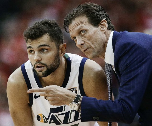 Utah Jazz Coach Quin Snyder gives instructions to Raul Neto during Wednesday night’s game against the Houston Rockets