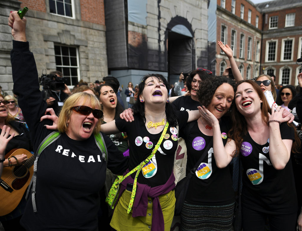 Women celebrate the result of yesterday's referendum on liberalizing abortion law in Dublin