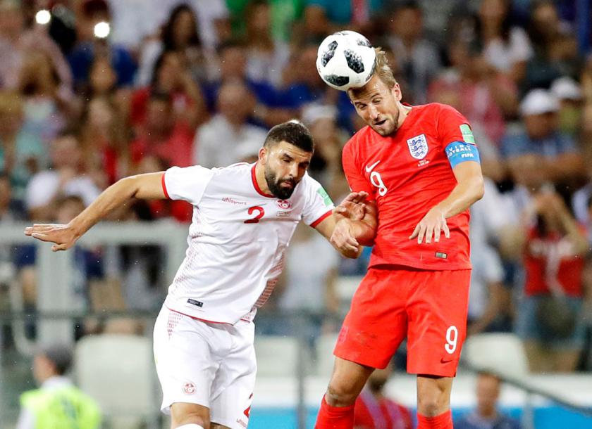 England’s Harry Kane right and Tunisia’s Syam Ben Youssef challenge for the ball during the group G match between Tunisia and England in the Volgograd Arena in Volgograd Russia on Monday