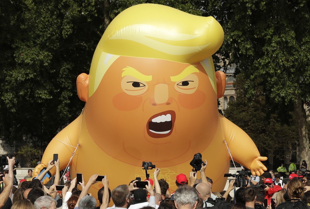 A six-meter high cartoon baby blimp of U.S. President Donald Trump is flown as a protest against his visit in Parliament Square in London England F