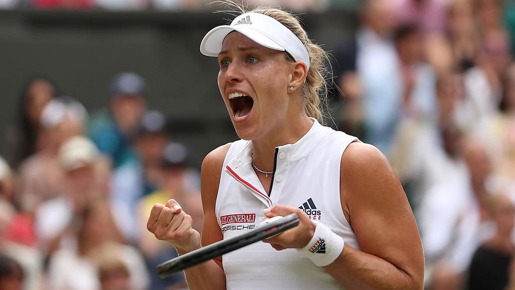 Single-minded
Kerber celebrates
her quarter-final
victory over
Kasatkina on Centre
Court yesterday