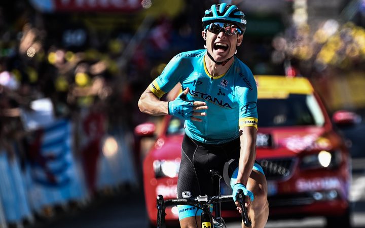 Denmark's Magnus Nielsen celebrates as he crosses the finish line to win the 15th stage of the Tour de France