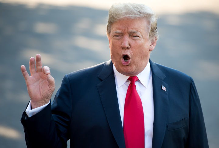 US President Donald Trump speaks to the media as he walks to Marine One prior to departure from the South Lawn of the White House in Washington DC