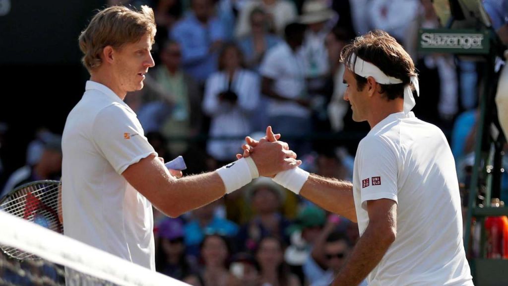 Kevin Anderson and Roger Federer after their match on Wednesday