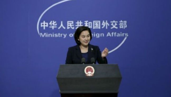 Hua Chunying spokeswoman of China’s Foreign Ministry gestures at a regular news conference in Beijing China Jan. 6 2016