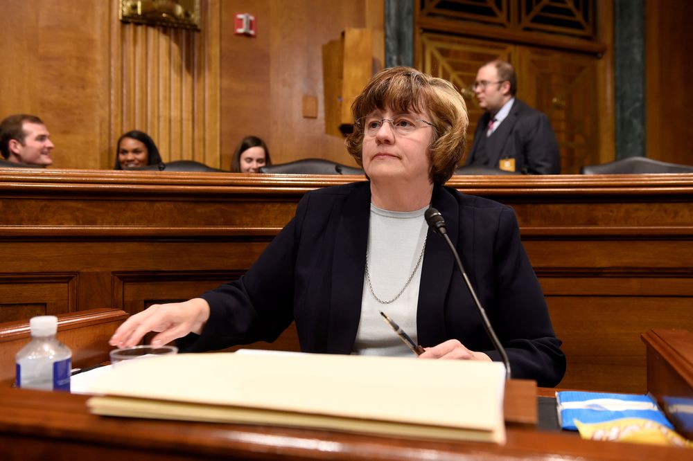 Rachel Mitchell a prosecutor from Arizona listens as Christine Blasey Ford testifies in front of the US Senate Judiciary Committee confirmation hearing on Capitol Hill in Washington