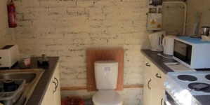 A standard home in which toilet is fixed in between kitchen: council ordered to demolish it