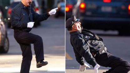 Traffic cop entertaining the passengers with his Michael Jackson moves