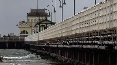 Woman busy on Facebook, walked on the edge of pier