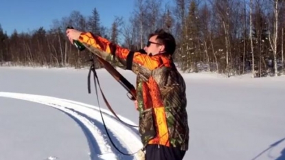 A Swedish hunter teaches how to open a beer bottle using a shotgun