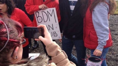 A man was supported by a flash mob to raise some money for his college