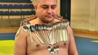 A ‘magnetic man’ who can attach lots of metal spoons to his body