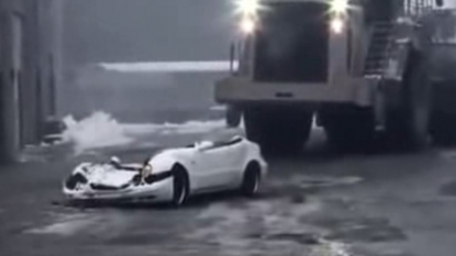 Angry worker destroys his boss’s sports car with a giant digger