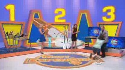 Excited contestant of a game shows jumped on the announcer after being unbalanced